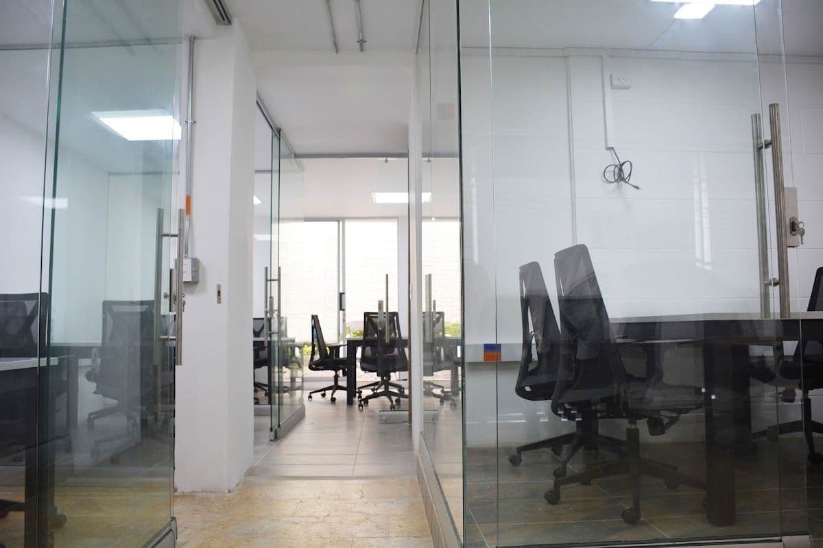 Grafia Coworking creative space with art and plants in El Poblado